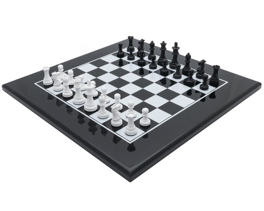The Monochrome Luxury Chess Set by Italfama with 2.8 inch king pieces and leatherette chess board in green and gold with screen-printed backgammon board.