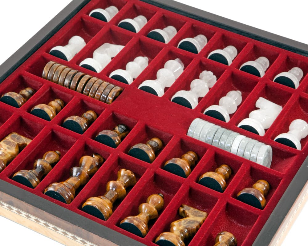 Brown and white alabaster chess pieces organized in a wooden cabinet with red velvet lining, handcrafted by Scali Alabastro of Italy.