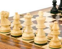 French Knight Series Ebonised Staunton Chess Pieces 3.25 Inches on wooden chessboard, featuring expertly turned boxwood chessmen