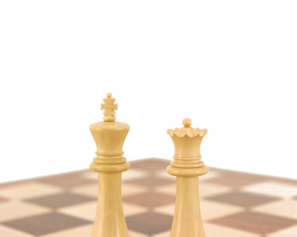 Sheesham and Boxwood chess king and queen from Victoria Series chessmen on a board