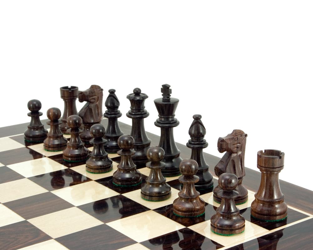 Luxurious rosewood Staunton chess pieces from the French Knight Series on a chessboard, featuring a 3.25-inch king.