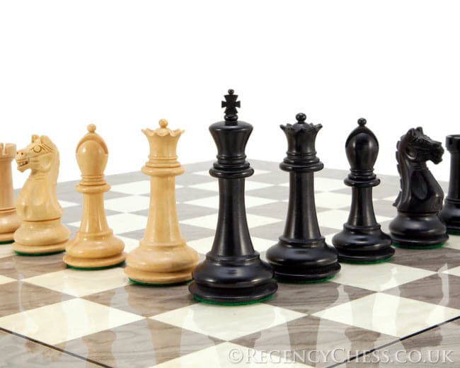 Beautiful Oxford Ash Burl Chess Set with handcrafted Staunton design pieces on a gloss grey ash burl board.