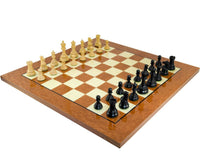 Large Cheltenham Ebony and Rootwood Grand Chess Set with handcrafted ebony pieces on a 24-inch Italian erable rootwood board.