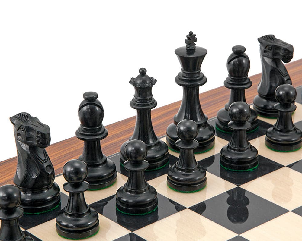 Supreme Ebony Chess Set with classic Staunton design on luxurious board, featuring expertly crafted and weighted ebony chess pieces.