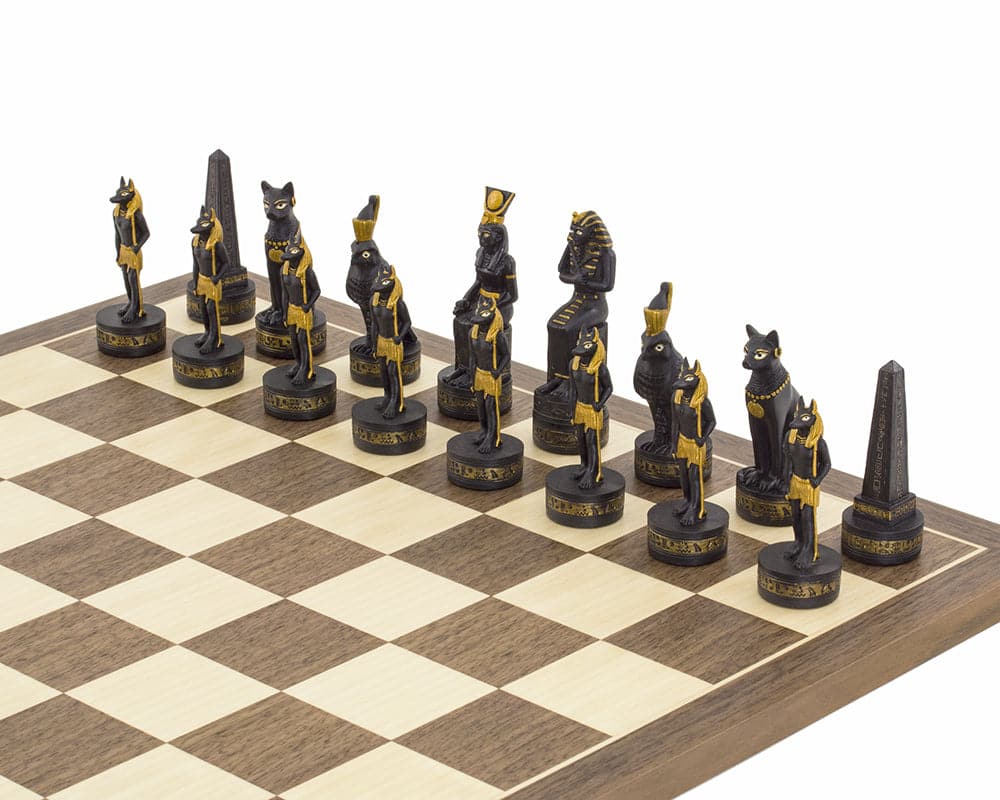 Ancient Egypt hand-painted themed chess set by Italfama on walnut and maple board, showcasing ornately painted black and gold pieces.