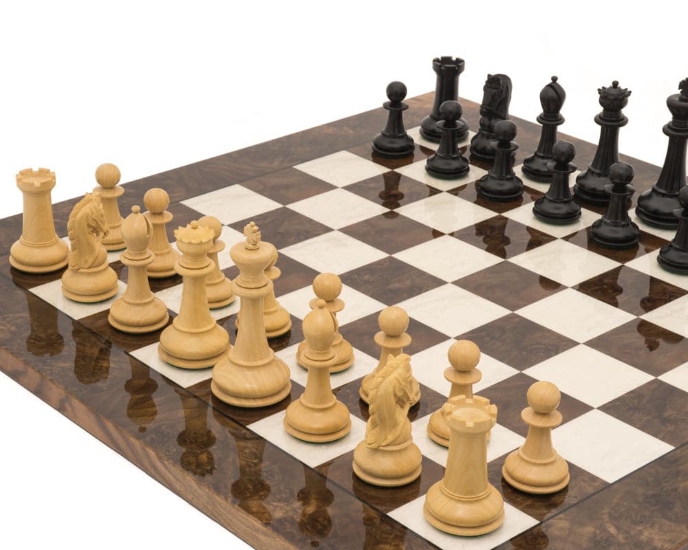 The Monarch Ebony And Walnut Grand Luxury Chess Set on a chess board ready for play