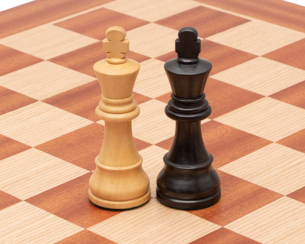 The Down Head Knight Tournament Edition Chess Set with 3.75 inch wooden king chess pieces on a high-quality Mahogany and Birch chessboard.