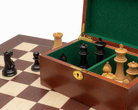 Luxury Staunton chess set with ebony and palisander pieces, mahogany cabinet, and 23.6 inch Spanish board.