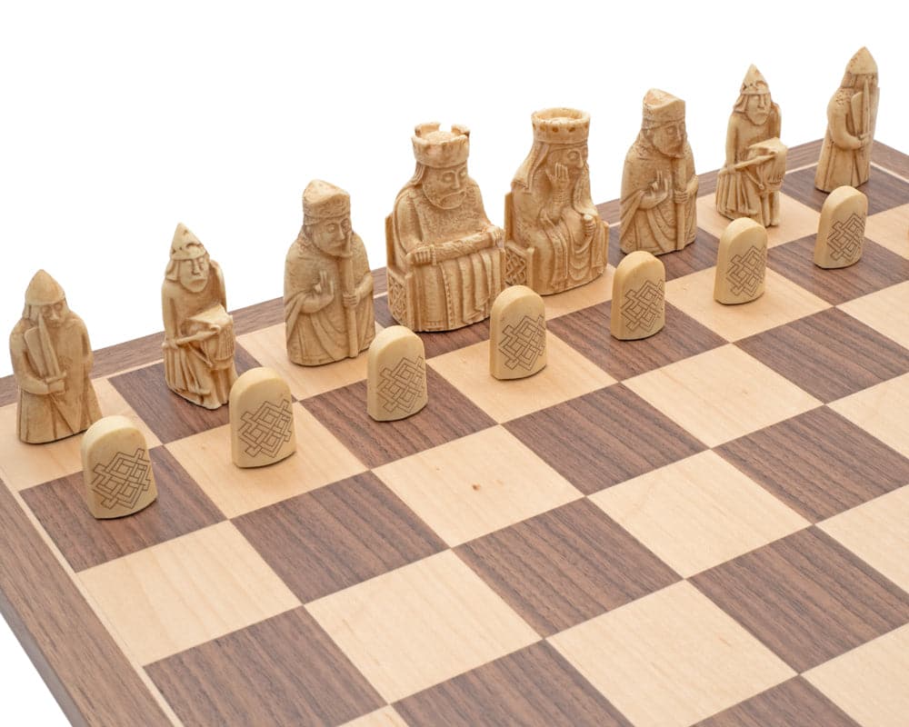 Handcrafted Isle of Lewis chessmen and board presentation set displaying exquisite detail by Italian craftsmen.