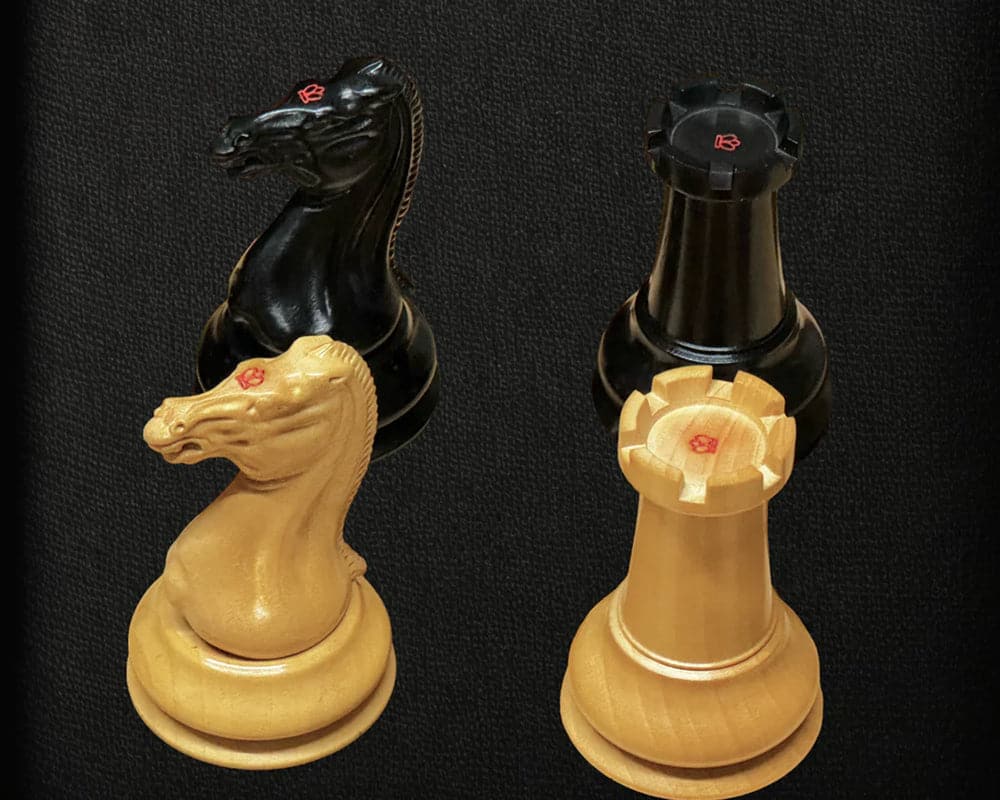Ebony and mahogany knights and rooks from the 1850 London Limited Edition Deluxe Chess set.